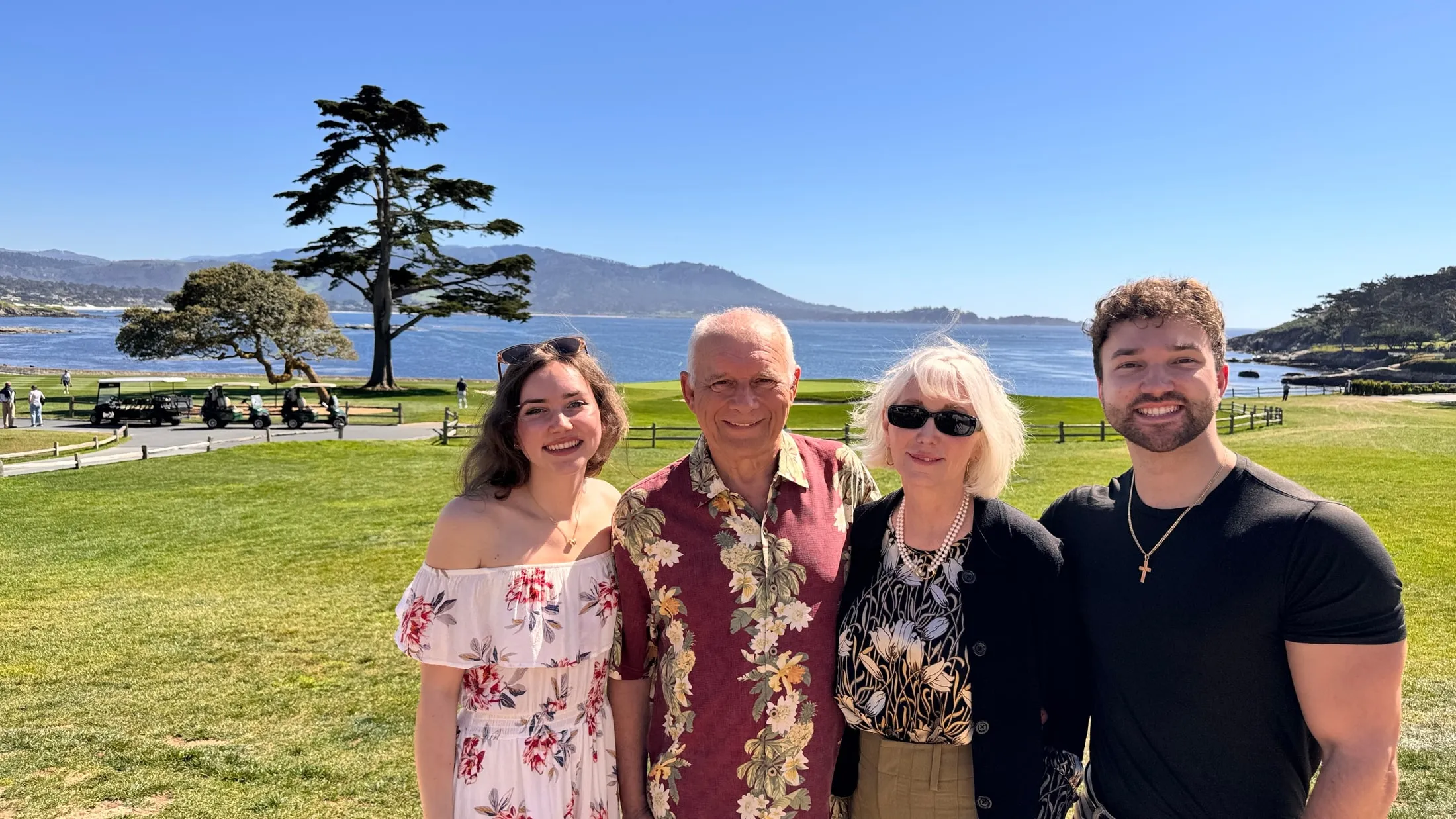 Andrew Kubica with his wife Colleen and two of his grandchildren, on the coast at Pebble Beach.